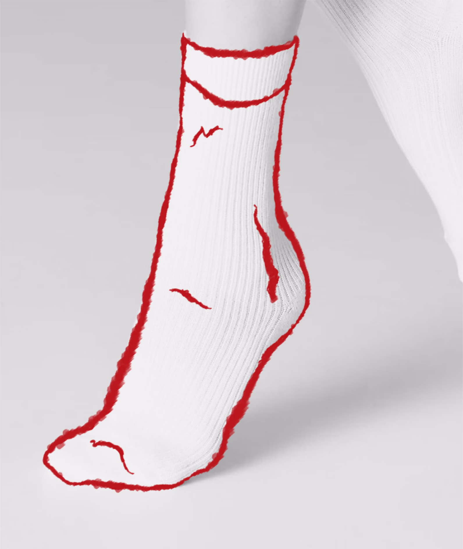 Ballet pointe shoes defaced with drawn red slouched socks
